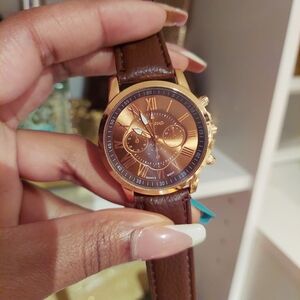 Brown rose gold watch